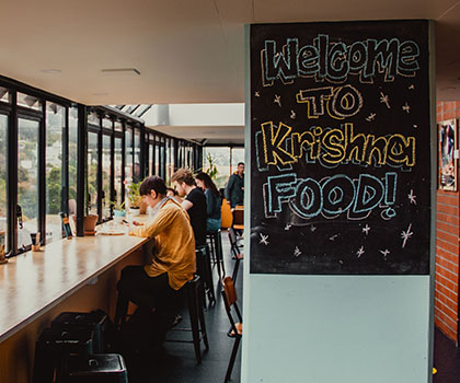 Welcome to Krishna Food sign